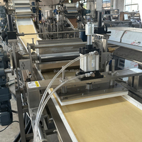 Ligne de production automatique GUSU 380V de barres de céréales, de chocolat et de protéines, capacité personnalisée
