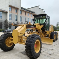 Niveleuse multifonction Caterpillar CAT120K 14 tonnes d'occasion, conforme EPA CE, niveleuse sur roues Cat140 avec pelle, moteur Cat C7 pour travaux de terrassement