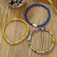 Bracelet extensible style bohème perles de riz, design Instagram, design color-block de niche, à porter en superposition, perles unisexe