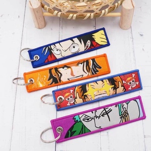 54 Design High Quality Embroidered Mixed Anime Flight Tag Keychain for Backpack Bag Decoration - Product Image 4