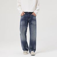 Jean large bleu foncé en denim délavé, coupe ample, taille mi-haute, style streetwear décontracté