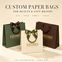 Sacs cadeaux en papier de luxe personnalisés avec poignées pour fabricant de bijoux OEM