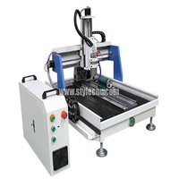 Routeur CNC de bureau d'entrée de gamme avec table rotative à 4 axes