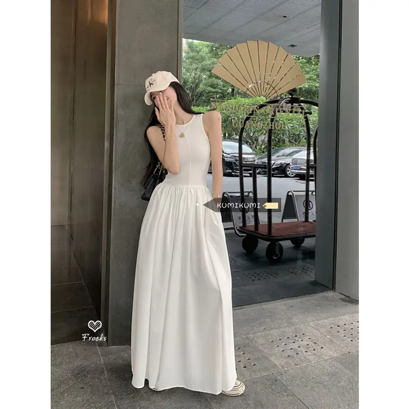 महिलाओं के कपड़ों की नई सफेद पोशाक महिलाओं की गर्मियों डिजाइन भावना जेब लंबी स्कर्ट बंद कमर स्लिमिंग स्कर्ट