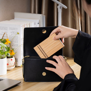 Universal lazy <b>stand</b> <b>for</b> mobile phones and <b>tablets</b>, compact and portable, bamboo desktop phone <b>stand</b> with two slots. - Product Image 1