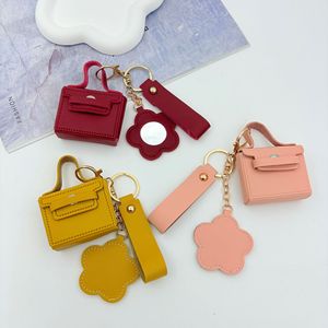 Mini porte-monnaie porte-clés en forme de <span class=keywords><strong>sac</strong></span> <span class=keywords><strong>à</strong></span> dos, breloque de <span class=keywords><strong>sac</strong></span> de créateur, mignon, en cuir PU, pochette <span class=keywords><strong>à</strong></span> monnaie, pendentif pour <span class=keywords><strong>sac</strong></span> <span class=keywords><strong>à</strong></span> main avec miroir floral - Product Image 4