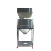 Machine de remplissage double tête haute performance 9999g grande capacité pour peser le riz, les céréales, les noix, les haricots, les fruits secs et les produits secs en vrac