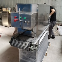 Équipement d'épluchage d'ail automatique Machine d'épluchage d'ail de pression d'air Machine d'épluchage d'ail de type chaîne