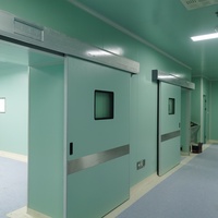 Puertas Corredizas Dobles de Acero con Apertura Lateral, Eléctricas, Modernas, Herméticas y Bien Selladas para Hospitales