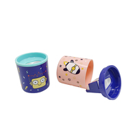 Taille-crayon double trou en forme de cylindre avec réservoir et capuchon amovible en plastique pour enfants, fournitures scolaires en gros