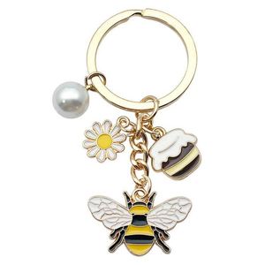 Wholesale Personalized Pearl Sun Flower Pendant Key Chain <b>Cute</b> Honey Bee Charm <b>Keyring</b> for Women - Product Image 1