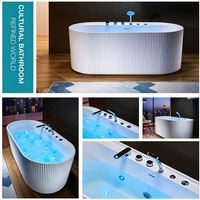 Baignoire autoportante ovale de luxe en acrylique cannelé avec LED, chromothérapie, jets d'air et hydrothérapie massante