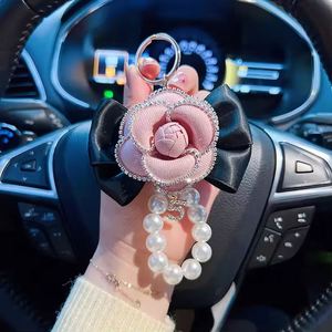 Breloque de sac en PU style coréen avec fleur de camélia et perles, accessoires porte-clés de voiture, pendentif de téléphone pour femme, décoration, cadeau de vacances - Product Image 4