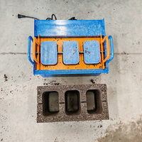 Machine à fabriquer des pavés manuelle à bas prix, machine à briques en béton manuelle pour les petites entreprises