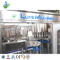 Machine d'embouteillage automatique d'eau minérale 3 en 1, ligne de production rotative de remplissage d'eau potable en bouteilles PET, 4000BPH