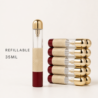 Flacon de parfum vide personnalisé de 35 ml, style stylo avec capuchon doré, flacon pulvérisateur en verre rechargeable, vente en gros, design arabe