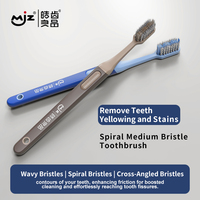 Brosse à dents attrayante pour adultes avec poils en spirale moyens et design croisé pour le nettoyage, vente en gros d'usine
