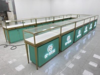 Vitrine de présentation de bijoux en verre avec éclairage LED tricolore, étanche et personnalisable pour centre commercial