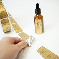 Autocollant cosmétique d'étiquette de bouteille de parfum privé imprimé imperméable à l'eau auto-adhésif personnalisé avec effet métallique