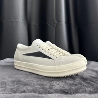Baskets basses pour hommes en cuir véritable, style skate, vintage, noir et blanc, semelle épaisse, chaussures de ville sombres avec décor triangulaire latéral