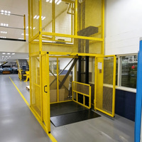 Plateforme élévatrice hydraulique verticale économique de type rail pour le levage de marchandises, idéale pour les projets logistiques d'entrepôt