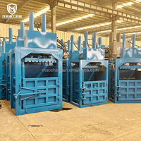 Presse à balles hydraulique verticale 220V pour le recyclage des déchets : mini bouteilles carrées en plastique, cartons en papier, canettes en aluminium