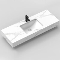 Vasque rectangulaire murale en pierre de quartz de style hôtelier avec support de robinet monotrou intégré en pierre frittée