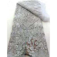 Tissu en dentelle de tulle brodé et perlé de luxe avec maille de perles de verre pour robe de mariée
