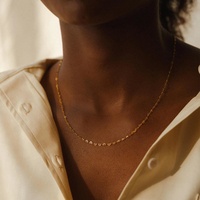 EMANCO Collier ras du cou classique et délicat en forme de cœur pour femme, en acier inoxydable plaqué or 14 carats, chaîne torsadée, pour le quotidien