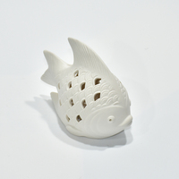 Statue de poisson en céramique blanche bougeoir maison ornement évider conception autres styles de lanternes et bocaux à bougies