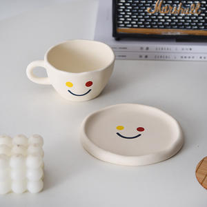 Taza y Platillo de Cerámica con Cara Divertida para Té, Café, Leche - Product Image 3