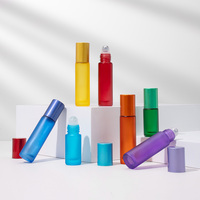 Flacon roll-on rond en verre personnalisé pour huiles essentielles et parfums 5ml 10ml avec impression de logo et emballage coffret cadeau