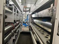 Machine professionnelle entièrement automatique d'impression 4 couleurs pour la fabrication de boîtes à pizza en carton ondulé, neuve, avec fonctions de rainurage et de découpe.