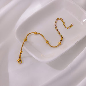 Chaîne <span class=keywords><strong>de</strong></span> perles <span class=keywords><strong>de</strong></span> serpent rond minimaliste européenne et américaine, chaîne <span class=keywords><strong>de</strong></span> pied pour femme en perles, chaîne <span class=keywords><strong>de</strong></span> <span class=keywords><strong>cheville</strong></span> en acier inoxydable plaqué 18 carats - Product Image 4