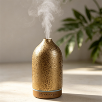 Diffuseur d'huiles essentielles ultrasonique, humidificateur d'air, diffuseur d'aromathérapie en céramique dorée pour la maison, la chambre et le bureau