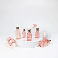 Flacon en verre vide pour huile essentielle en gros avec compte-gouttes, flacon rond de Boston rose pour sérum de soin de la peau, huile capillaire