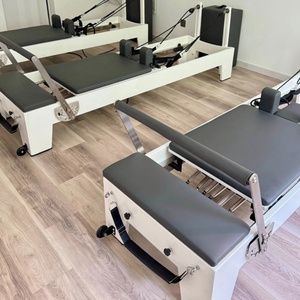 เครื่องรีฟอร์มเมอร์พิลาทิส ยี่ห้อ Core Bed ทำจากหนังสีชมพูและไม้โอ๊ค สำหรับใช้ในสตูดิโอออกกำลังกายและที่บ้าน กำลังลดราคา - Product Image 3