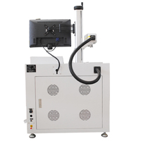 Machine de marquage laser à fibre de bureau Raytu équipée d'un dispositif rotatif pour une gravure de haute précision