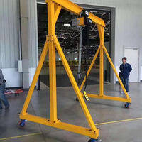 Grue portique mobile électrique portable APAX CRANE 2 tonnes, hauteur de levage 6 m, portée 5 m, avec moteur, boîte de vitesses et roues, et palan.