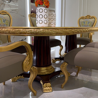Table de salle à manger ovale massif, sur piédestal, ornée, artisanale, brillante, en bois de burl noble, de style traditionnel et patrimoniaux, pour galas, événements et réceptions