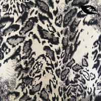 Tissu imprimé marbré monochrome tendance pour robe femme / Textile haute couture à effet encre