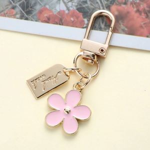 Flower Metal Keychains White Black Pink Daisy Cute Flower Keychain Accessories KeyRing Handbag <b>Key</b> <b>Rings</b> Charms Pendant Decor - Product Image 6