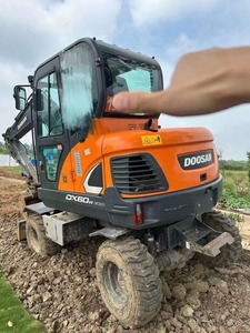 Excavatrice sur pneus Doosan 6 tonnes DX60W d'occasion avec boîte de vitesse pompe moteur et PLC fabriquée en Corée à vendre - Product Image 6