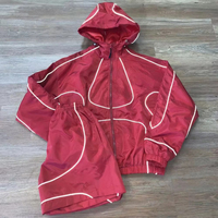 Veste coupe-vent à capuche en nylon avec ligne de couture réfléchissante personnalisée, short assorti à taille élastique, ensemble 2 pièces streetwear pour homme, OEM