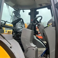 Chargeuse-pelleteuse Caterpillar 420F IT d'occasion (99% neuve) avec flèche télescopique, godet 4-en-1, cabine de luxe, multifonctionnelle, certifiée CE EPA