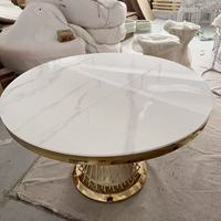 Table à manger de mariage à base métallique ronde en acier inoxydable doré à dessus de marbre blanc pour banquet d'événement