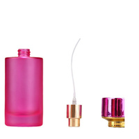 Flacon de parfum de luxe transparent de grande capacité, couleur personnalisée, vente chaude, 50 ml, flacon de parfum rond en verre avec bouchon pulvérisateur doré
