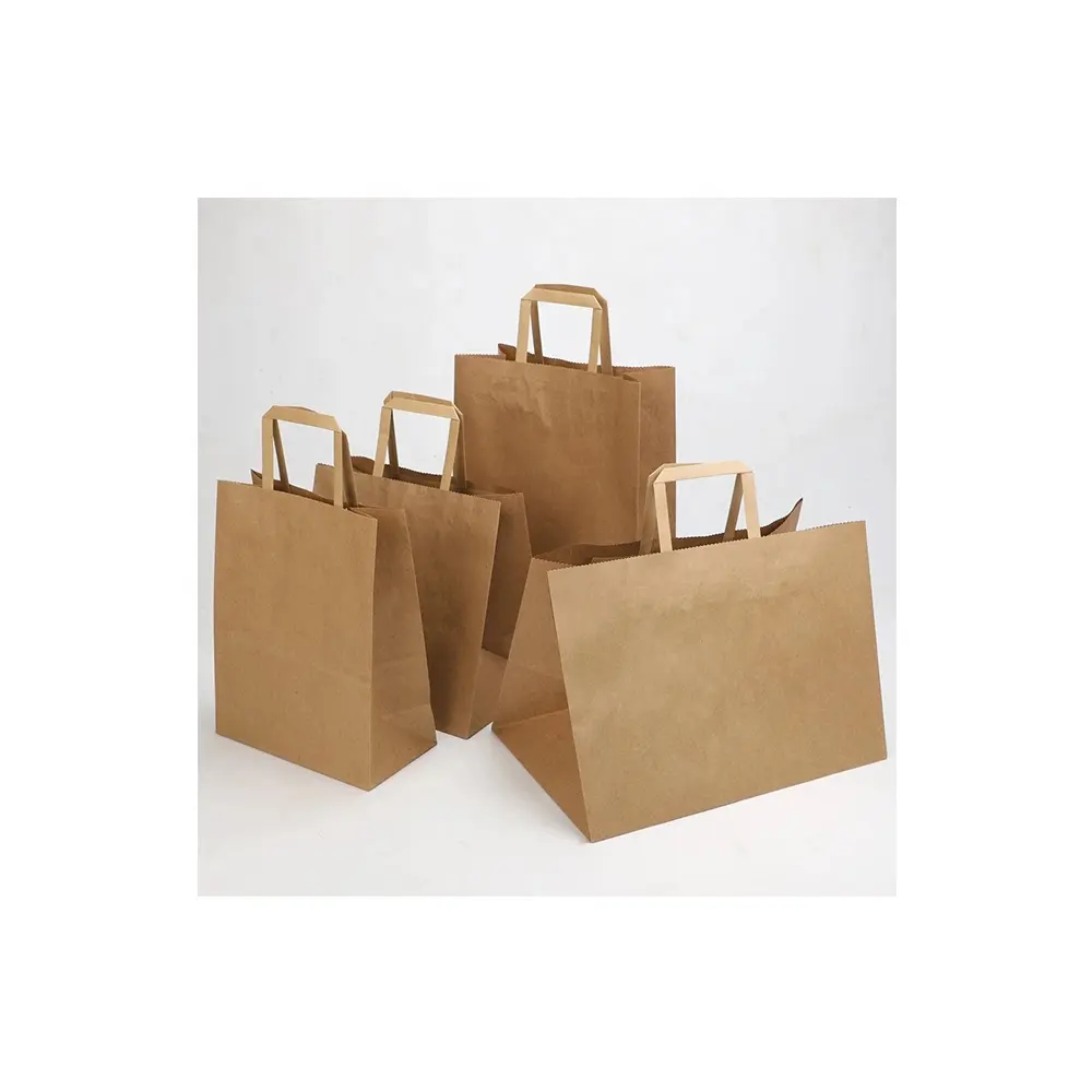 Sacchetti di carta Kraft di alta qualità con Logo personalizzato sacchetti di carta Kraft marrone imballaggio sacchetto di carta regalo da asporto con manici per lo Shopping