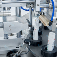Machine de remplissage et de scellage automatique à grande vitesse avec système de scellage par ultrasons pour le remplissage et le scellage des tubes de crème, de lotion et de shampoing