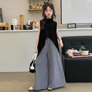 Ensemble 2 pièces tendance pour adolescentes 2026 : Haut asymétrique sans manches noir + Pantalon large à carreaux - Product Image 5
